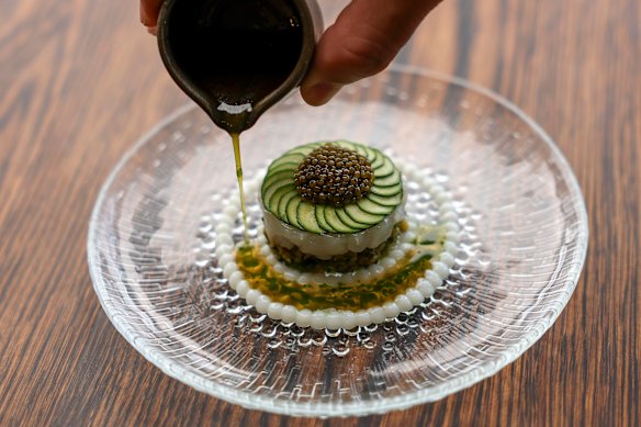 Raw scallops and caviar with zucchini, chive oil and jalapeno.