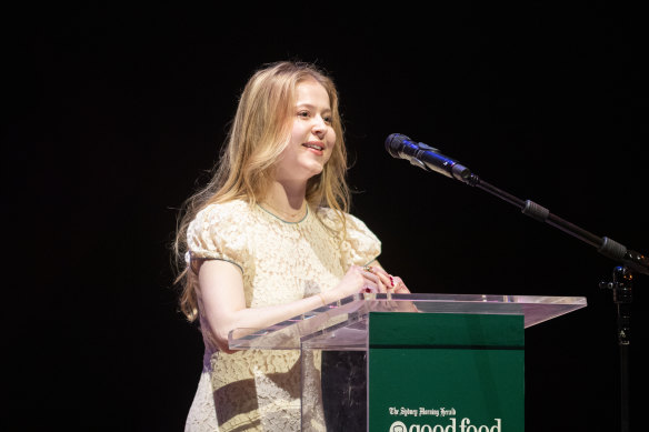 Edie Elliott Granger accepts the Vittoria Coffee Legend Award on behalf of her father, Bill.
