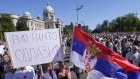 Serbian protestors in 2021 hold a banner that urges Rio Tinto to “go away”.