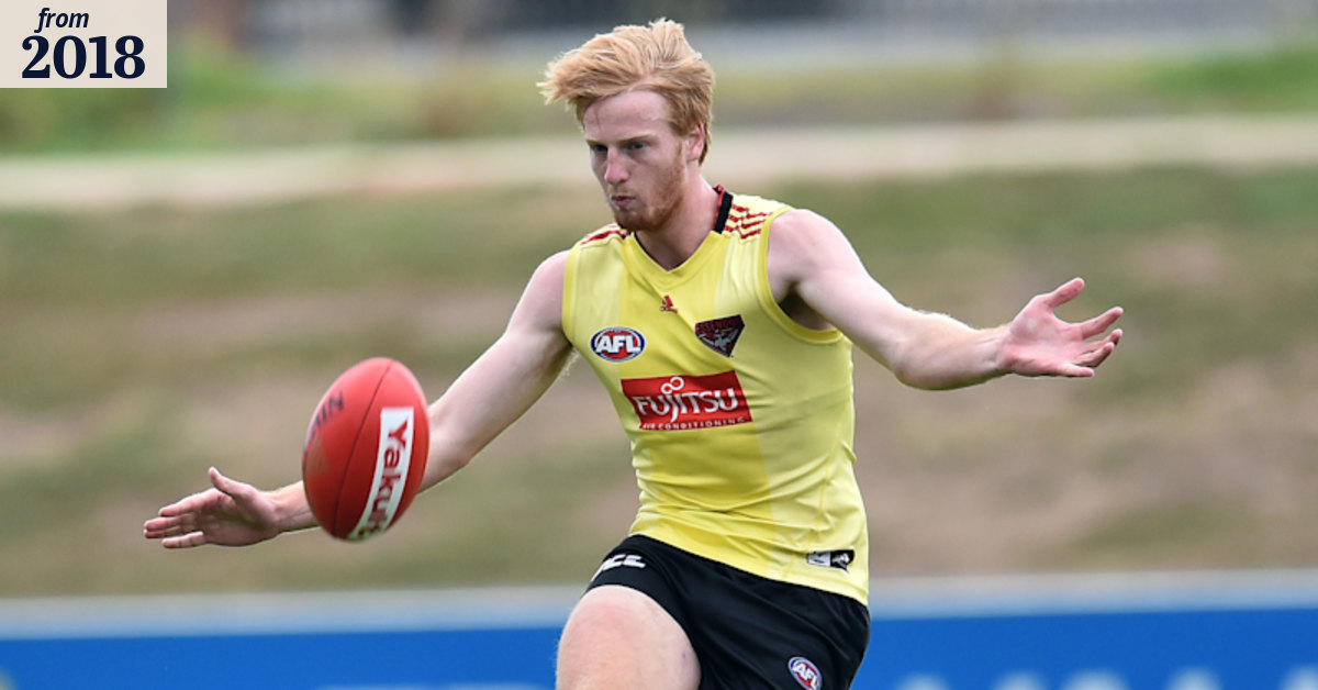 Essendon's Aaron Francis takes time out from AFL