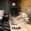Chef Tomotaka Ishizuka behind the counter at Tomo-An kaiseki restaurant.