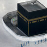 Workers disinfect the ground around the Kaaba, the cubic building at the Grand Mosque, in the Muslim holy city of Mecca, Saudi Arabia. The site is now closed.