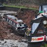 Boats lie damaged after a canal embankment collapsed in Whitchurch, Shropshire, west England.