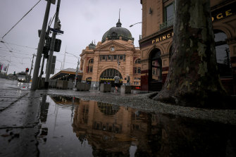 It was a quiet and wet morning in Melbourne on Saturday, as the state reached a new daily high for coronavirus cases. 