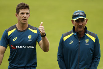 Tim Paine (left), pictured here with Australian coach Justin Langer, says he still hopes to play in this summer’s Ashes.