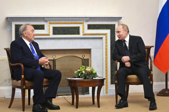 Russian President Vladimir Putin, right, speaks to former president of Kazakhstan Nursultan Nazarbayev, at Konstantin Palace in Strelna, Russia, a week before protests broke out in Kazakhstan.