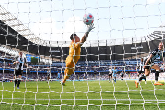 Newcastle’s keeper Martin Dubravka fails to stop Raheem Sterling’s shot on goal.