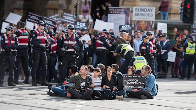 Police move in on protesters blocking streets at Melbourne’s Flinders Street
Station in April. 