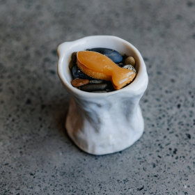 Fish bone flour cookies with fish fat caramel. 