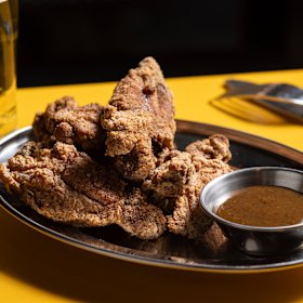 Fried chicken “chops” with burnt pineapple sauce.