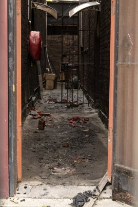 Debris litters the temple floor after the fire.