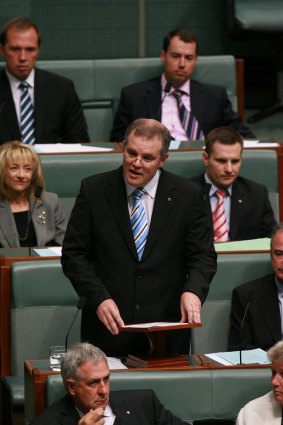 Mr Morrison making his maiden speech in 2008. Peter Dutton is sitting behind him, left.