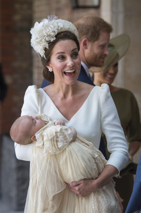 Kate, Duchess of Cambridge, carries Prince Louis as they arrive for his christening service at the Chapel Royal, London, on Monday.