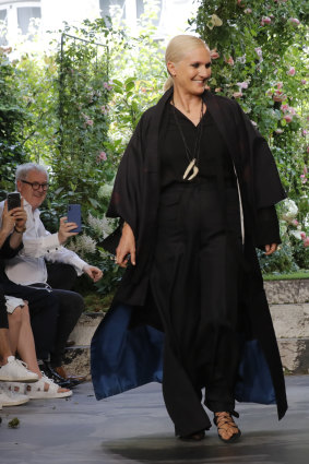 Designer Maria Grazia Chiuri accepts applause at the end of the Dior Haute Couture Fall-Winter 2020 fashion collection presented in Paris on Monday July 1, 2019. 