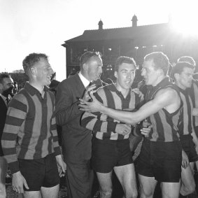 Excited players after Hawthorn’s first VFL premiership.