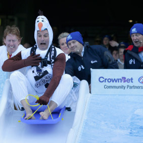 Port Adelaide chairman and TV personality David Koch, pictured getting into the spirit of ‘Big Freeze 2’ at the MCG, has fired back at former Collingwood counterpart Eddie McGuire.