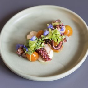 The octopus with pickled tomatoes at Frederic’s is pretty as a picture.