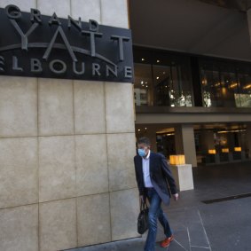 A quarantine worker at the Grand Hyatt tested positive.