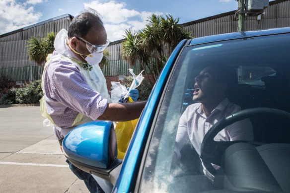 Dr Mukesh Haikerwal at his drive through clinic last year.