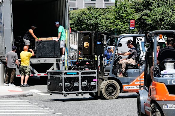 Trucks are unloaded outside Madison Square Gardens on Thursday (Friday AEST).