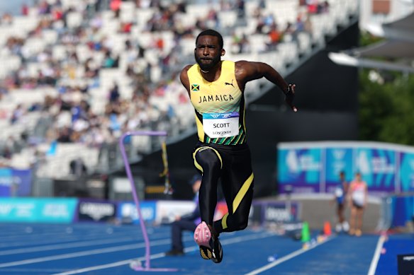 Jamaica’s Jordan Scott competes in the men’s triple jump final.