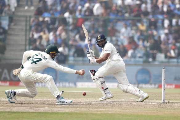 Rohit Sharma plays a shot.