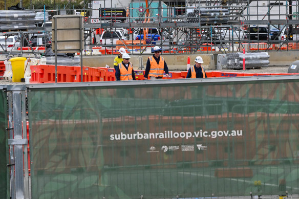 Workers at a Suburban Rail Loop construction site in Heatherton.
