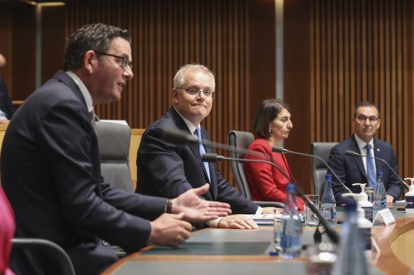 Victorian Premier Daniel Andrews alongside NSW Premier Gladys Berejiklian and Prime Minister Scott Morrison on Friday.