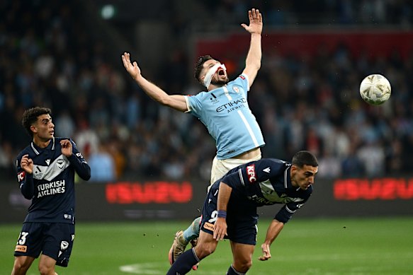 Mathew Leckie of the City celebrates winning the A-League championship.