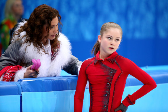 Yulia Lipnitskaya with her coach Eteri Tutberidze at the Winter Games in Sochi in 2014.