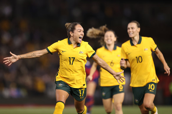 Kyah Simon celebrates after scoring against the US in a friendly in 2021.