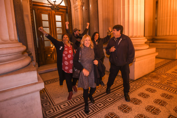 Members of the First Peoples’ Assembly of Victoria celebrate the passing of the Treaty Authority bill at state parliament on Tuesday evening.
