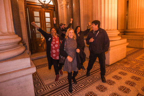 Members of the First Peoples’ Assembly of Victoria celebrate the passing of the Treaty Authority bill at state parliament on Tuesday evening.