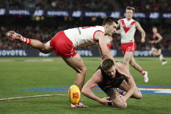 Sydney’s Logan McDonald and Essendon’s Jayden Laverde contest the ball at Marvel Stadium.