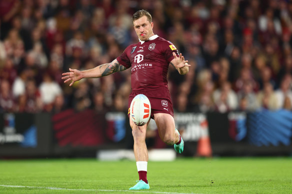 Cam Munster puts a kick in for Queensland in State of Origin.