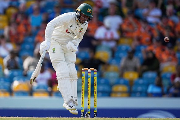 Australia’s Usman Khawaja is dismissed LBW by Alzarri Joseph. 