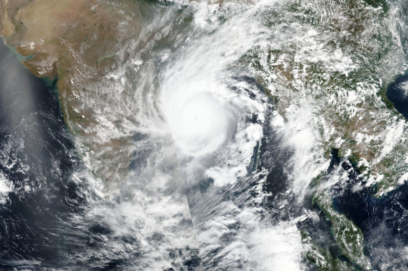 This Tuesday, May 19, satellite image released by NASA shows Cyclone Amphan over the Bay of Bengal in India.