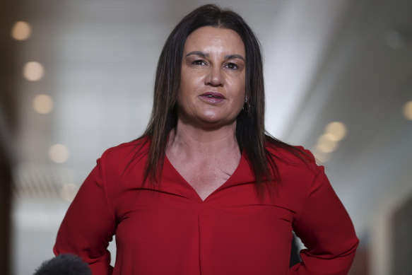Jacqui Lambie has denied making a homophobic slur to staff at the airport. 