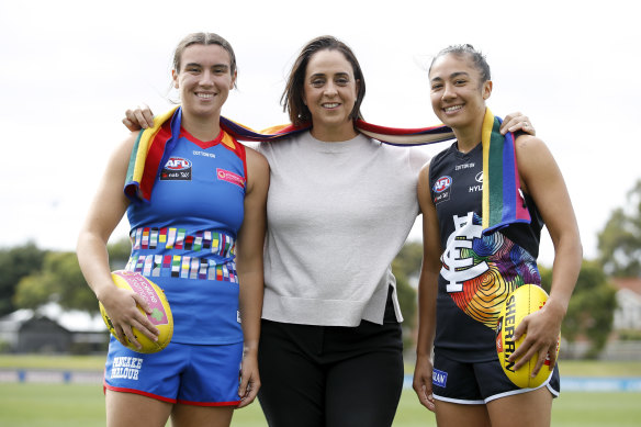 Bonnie Toogood, AFLW boss Nicole Livingstone and Darcy Vescio at the Pride Round launch in February.