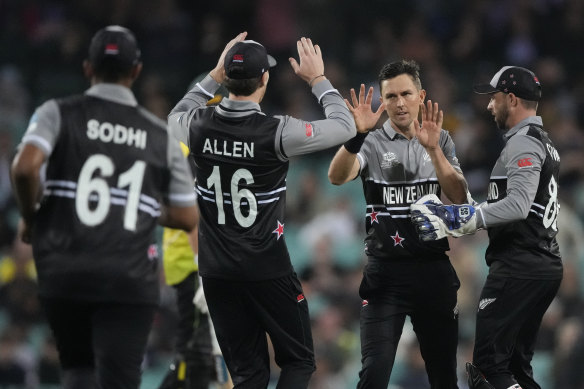 New Zealand bowling star Trent Boult celebrates a wicket with hard-hitting opening batsman Finn Allen.