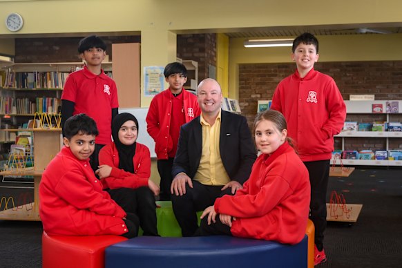 Bethal Primary School principal David Warren with some of the school’s NAPLAN high achievers. Rear from left: Hamza Ghulam, Omer Ghulam and Yasin Coskun. Front: Ayman Alsabri, Zainab Zahra and Mariam Haddad.