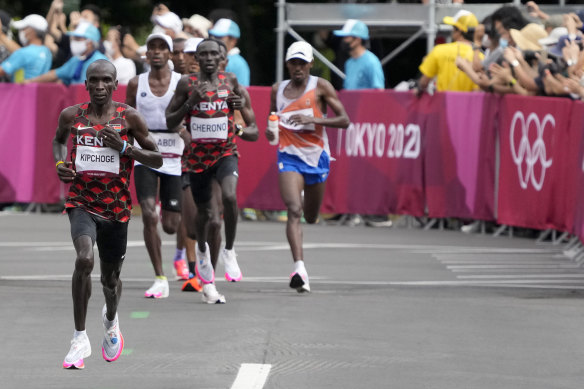 Eliud Kipchoge pushes ahead of the pack on his way to winning a second Olympic gold medal in Tokyo.