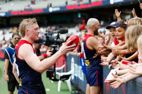 Clayton Oliver greets fans, who gave him a standing ovation in the last quarter, after the win.