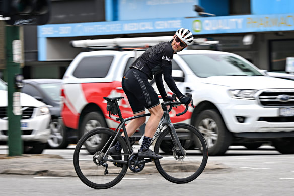 Glenn Jessop rides through the same intersection he was crossing on a green light when four-wheel drive turned right in front of him, causing him to smash into the side of the car.