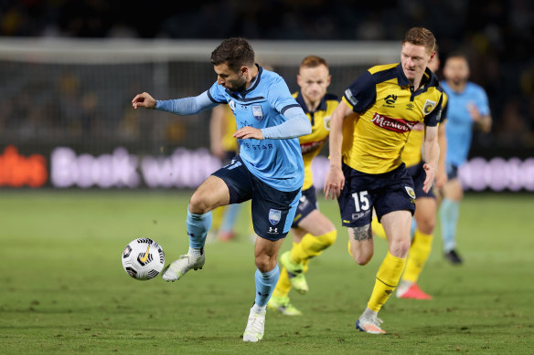 Kosta Barbarouses tries to break free of Kye Rowles.