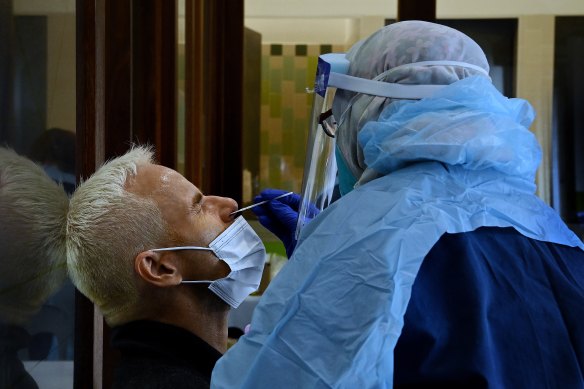 St Vincent’s Hospital staff conduct COVID-19 tests at their clinic in Darlinghurst on Thursday.