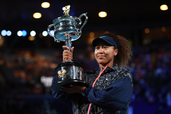 Naomi Osaka with the trophy after her victory over Jennifer Brady in the women’s final.
