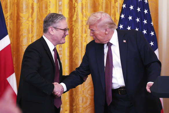 British Prime Minister Keir Starmer (left) and US President Donald Trump shake hands at a joint press conference at the White House.