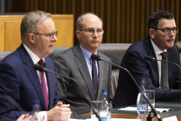 Chief Medical Officer Professor Paul Kelly, centre, is working on a national plan to deal with future COVID-19 waves.