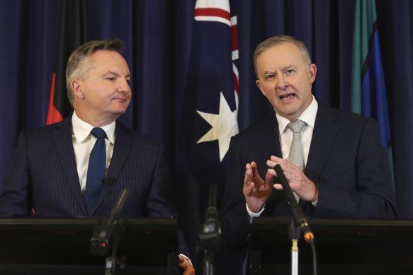 Labor’s climate spokesman Chris Bowen and leader Anthony Albanese. Mr Albanese reminded caucus members on Tuesday he had often said he would “kick with the wind in the fourth quarter” of the election cycle.